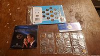Full lot showing Olympic card, Royal Wedding coin card, three blister packs