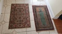 Both rugs side by side on floor