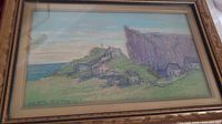 Full view of framed artwork showing coastal village scene, frame and glazing