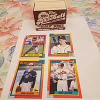 Four baseball cards from the set displayed outside the box. Cards pictured: Carlos Baerga (Indians), Travis Fryman (Tigers), John Olerud (Blue Jays), Dave Justice (Braves).