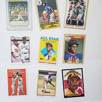 Photo of 9 vintage Major League Baseball sports cards arranged on white background showing various players including Dwight Gooden, Bo Jackson, and Tony Gwynn.