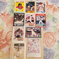 Photo of 10 vintage baseball sports cards showing Don Mattingly, Bo Jackson, Griffey Sr. and Jr., Greg Maddux, Rickey Henderson, Juan Gonzalez.