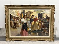 Framed oil painting showing Italian market scene, ornate frame visible