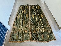 Full view of both velvet panels laid flat showing color, embroidery, and size
