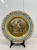 Full view of front of cabinet plate on stand