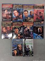 Photo of the front covers of 10 Star Trek Deep Space Nine novels, showing titles and cover art.