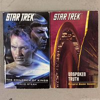 Front covers of two Star Trek paperback books: The Children of Kings by David Stern on left, Unspoken Truth by Margaret Wander Bonanno on right.