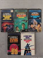 Front covers of five Star Trek novels with colorful sci-fi themed artwork and series branding Timescape.