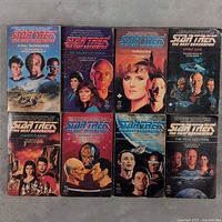 Front covers of 8 Star Trek: The Next Generation paperback novels arranged in two rows showing cover art and titles.