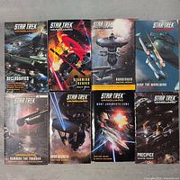 Front covers of 8 Star Trek Vanguard novels showing titles and artwork.