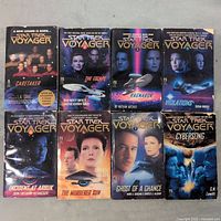 Front covers of 8 Star Trek Voyager novels showing titles and character graphics.