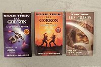 Front covers of the three Star Trek I.K.S. Gorkon paperback novels showing titles and author.