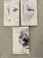 Front covers of three Star Trek novels (Exodus, Exiles, and Epiphany) from the Vulcan's Soul series, showing distinctive artistic close-up faces on each cover.