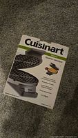 Front of Cuisinart waffle maker box showing product image and branding