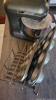 Mixer, muffin pans in rack