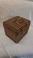 closed wicker picnic basket