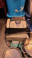 Top view showing Brother Personal fax machine with handset and control panel