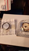 Both crystal clocks side by side showing overall forms