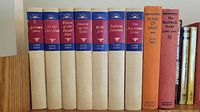 Nine cream cloth and two orange cloth Zane Grey hardback spines showing specific titles