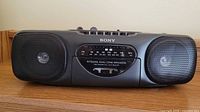 Front view of Sony radio cassette boombox showing speakers and controls