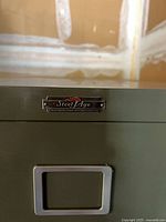 Close-up of Steel Age badge on top edge