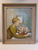 Full view of the oil on board painting in its wood frame