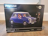 Front view of new Playmobil Mini Cooper set box showing vehicle and figures on packaging, listing 41 pieces.