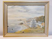 Full view of the framed oil painting showing the coastal scene with the dovecote and village near Dunure Castle.