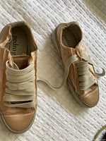 Top view of Pedro Garcia sneakers showing satin and suede material, frayed edges design, thick cream laces, and size 37 insole branding.