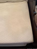 Top view of the white Casper California King mattress showing diamond quilted texture.