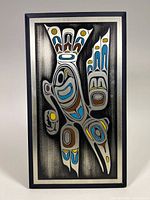 Full view of the etched aluminum plaque showcasing the Raven design with frame.