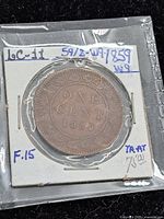 Reverse side of 1859 Canadian large cent in 2x2 flip