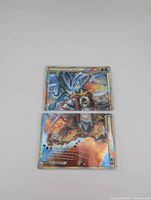 Top and bottom halves of the two Pokemon cards together forming one combined image featuring Suicune and Entei with holographic foil.