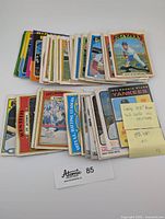 Multiple early 1970s MLB baseball cards arranged in spread, showing front sides with artwork and player images.