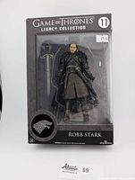 Front view of sealed Robb Stark figure in original box with sword accessory