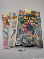 Three Batman Family comic books from the 1970s stacked together, showcasing their colorful illustrated covers and vintage condition.