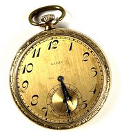 Front view of the gold plated Elgin pocket watch, showing the gold-toned dial with black numerals and a seconds subdial.