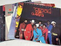 Photo showing seven vinyl album covers fanned out highlighting Kool and the Gang's Something Special in front.
