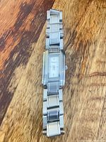 Full view of watch showing bracelet and case