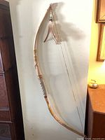 Full view of 57" bow hanging on wall