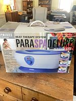 Front of sealed box showing product image and branding