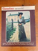 Front cover showing period-costumed woman outside farmhouse, dated July 1 1967