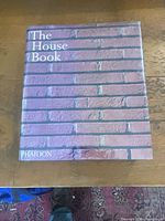 Front cover showing title and brick design