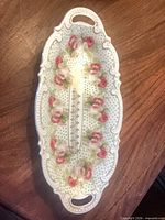 Top view of porcelain relish dish showing overall shape, decoration and condition