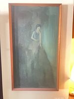 Full view of framed vertical painting