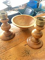 Candlesticks and bowl on table