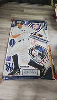 Full view of the vinyl wall mural showing Alex Rodriguez in action along with baseball-themed graphics and New York Yankees logos.