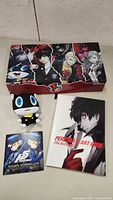 Full box set photo showing the box, plushie, art book, and soundtrack case