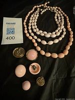 Necklace laid out with all earrings visible