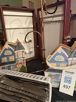 Overall lot showing jewelry box, two house plaques, tray of knives